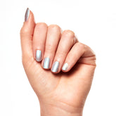 A close up fair skin model's nail shot wearing Salon Perfect Nail Lacquer .5oz 413 Moon Beam.
